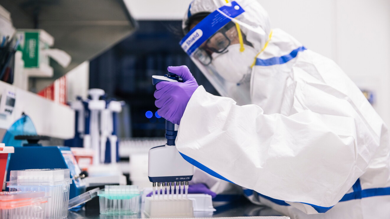 someone in ppe working in lab