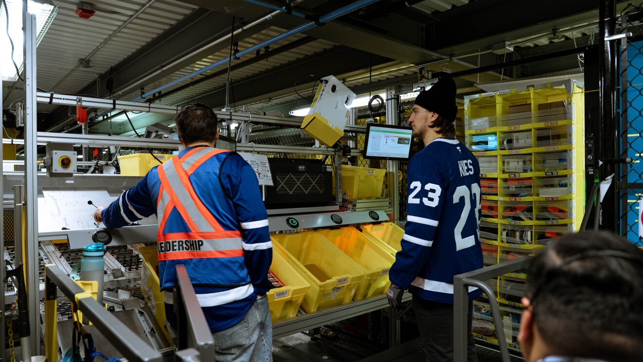 Toronto Maple Leafs hockey player packing boxes 
