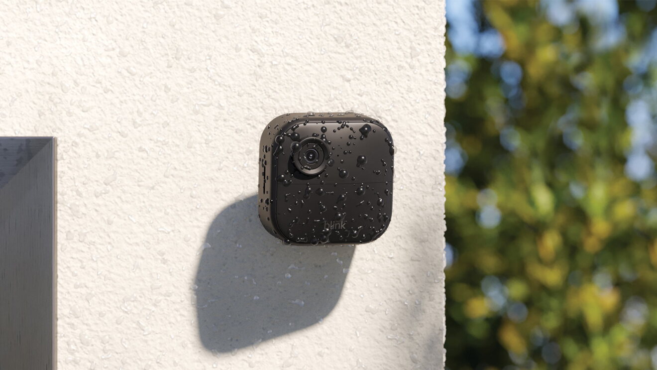 Waterproof Blink outdoor camera with raindrops on lens