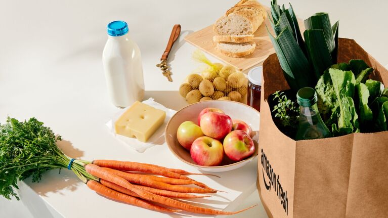 Grocery delivery including fresh produce, milk, bread, and cheese