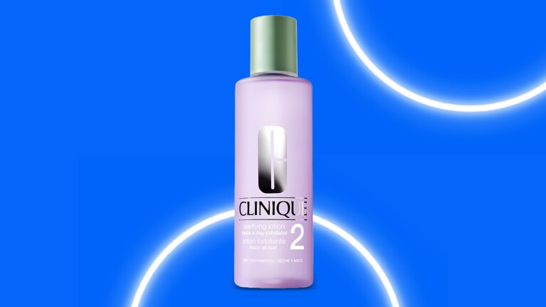Clinique Clarifying Lotion 2 bottle with green cap against electric blue backdrop