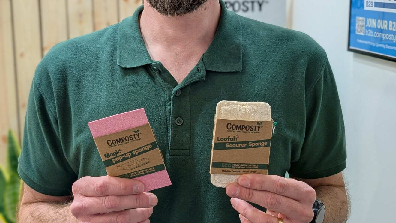 Composty Co-Founder, Matt Guest, holding two Composty sponges