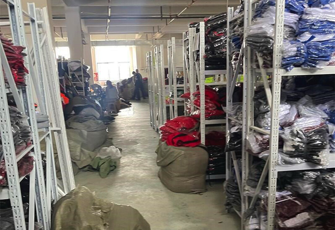 The inside of a warehouse with items packaged up and on shelves. The location of one of Amazon's raids.