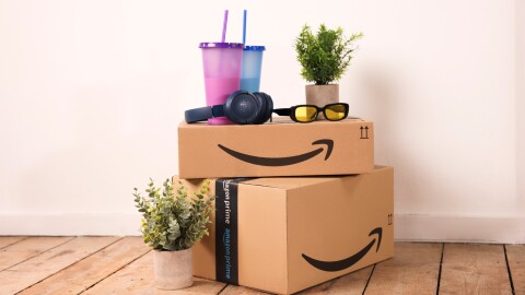 Amazon Prime boxes stacked on top of each other in a customer's home