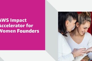 An image of two women looking at a screen. Text on the right side of the image says "AWS Impact Accelerator for Women Founders."