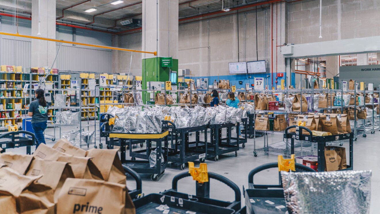 The Magic Library at the Amazon Fresh fulfillment centre filled with packages ready for pick up by delivery drivers