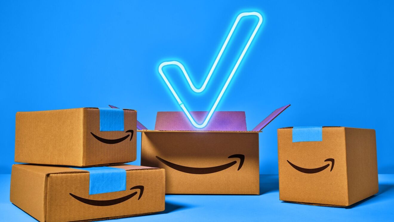 Four Amazon boxes with a lit up checkmark over the top of the boxes.