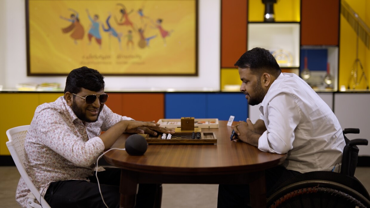 Two visually impaired men explore Echo