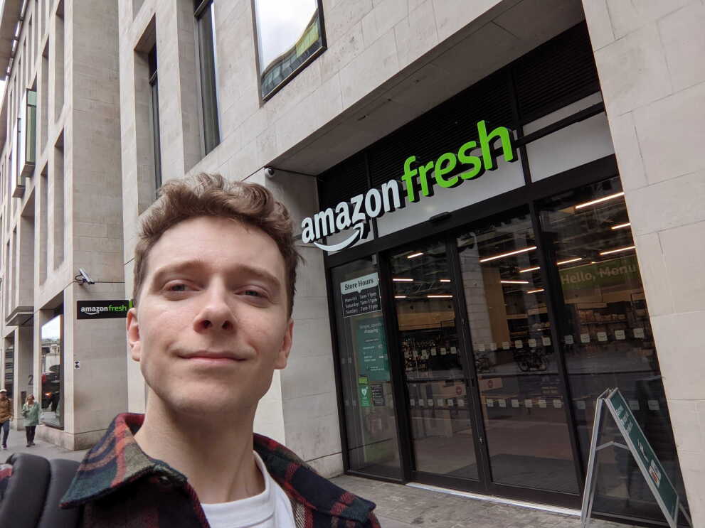 Tom at the entrance to the Amazon Fresh Monument store