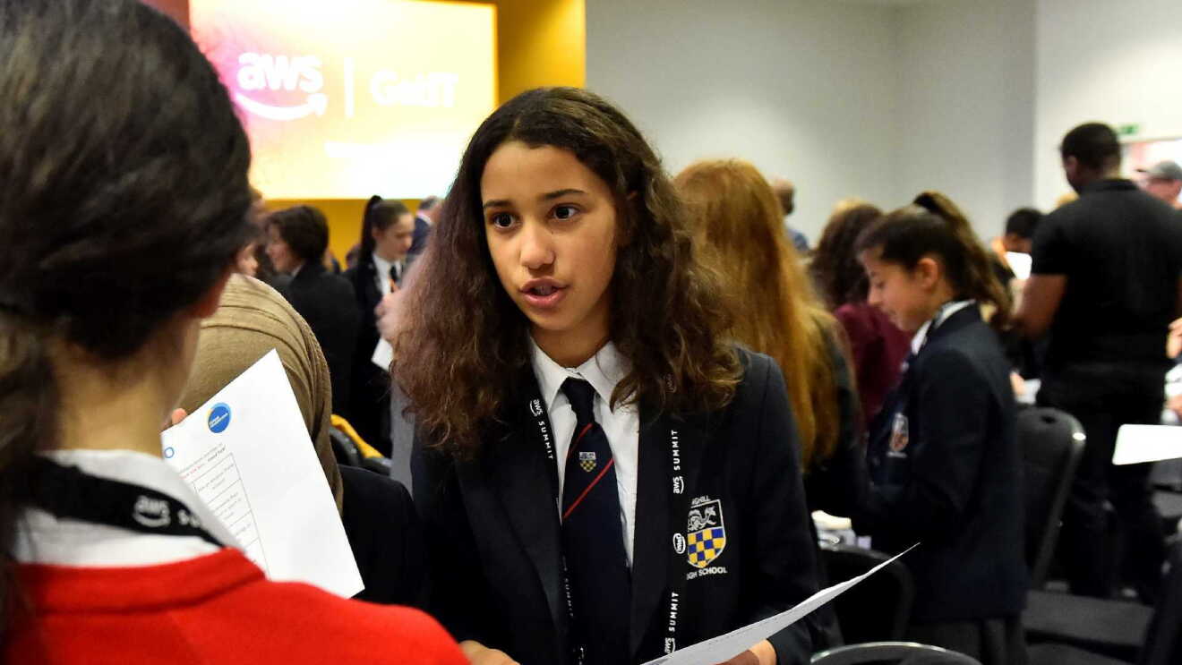 Students talking to each other at the AWS Get IT event 