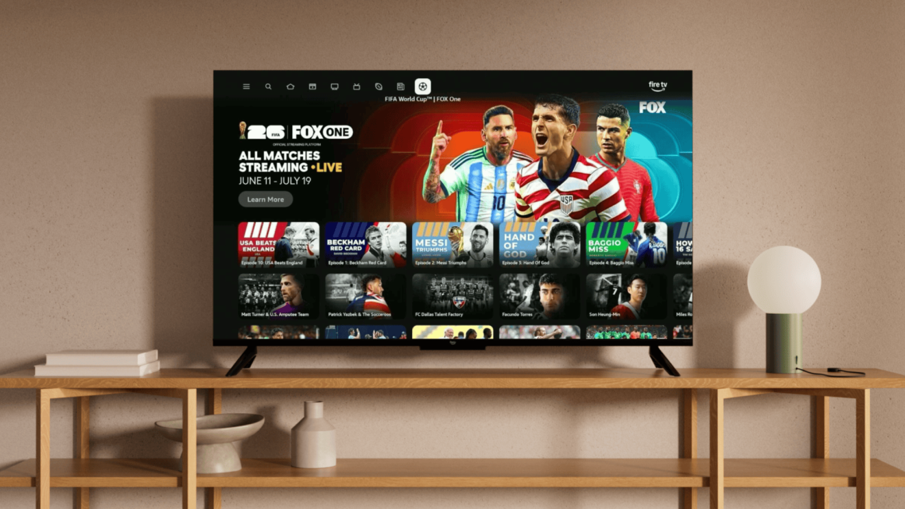 TV displaying FOX Sports streaming service with FIFA World Cup promotional banner and soccer documentary thumbnails
