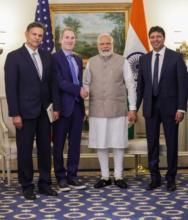 Prime Minister Narendra Modi flanked by senior Amazon executives