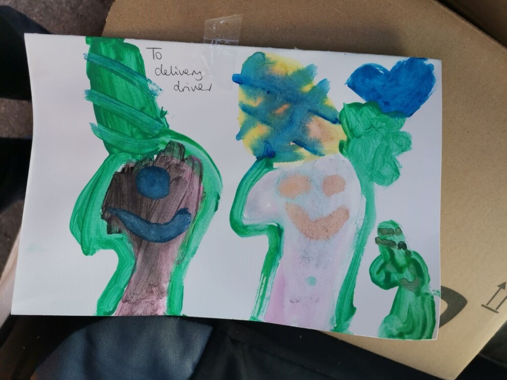 A colourful child's painting for an Amazon delivery driver with a note saying 'to delivery driver'