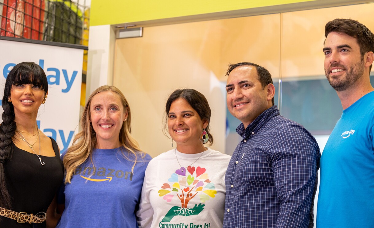 Amazon employees surprise nonprofits and schools with donations of various items.