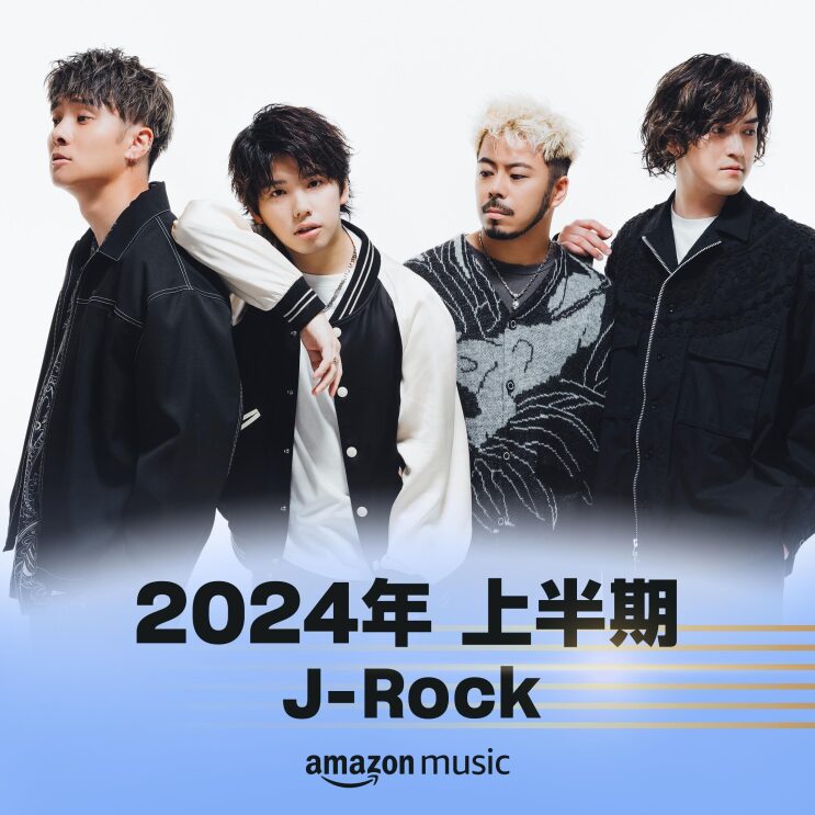 4人の男性 (ONE OK ROCK) がモノトーンの服を着て並んで立っている。