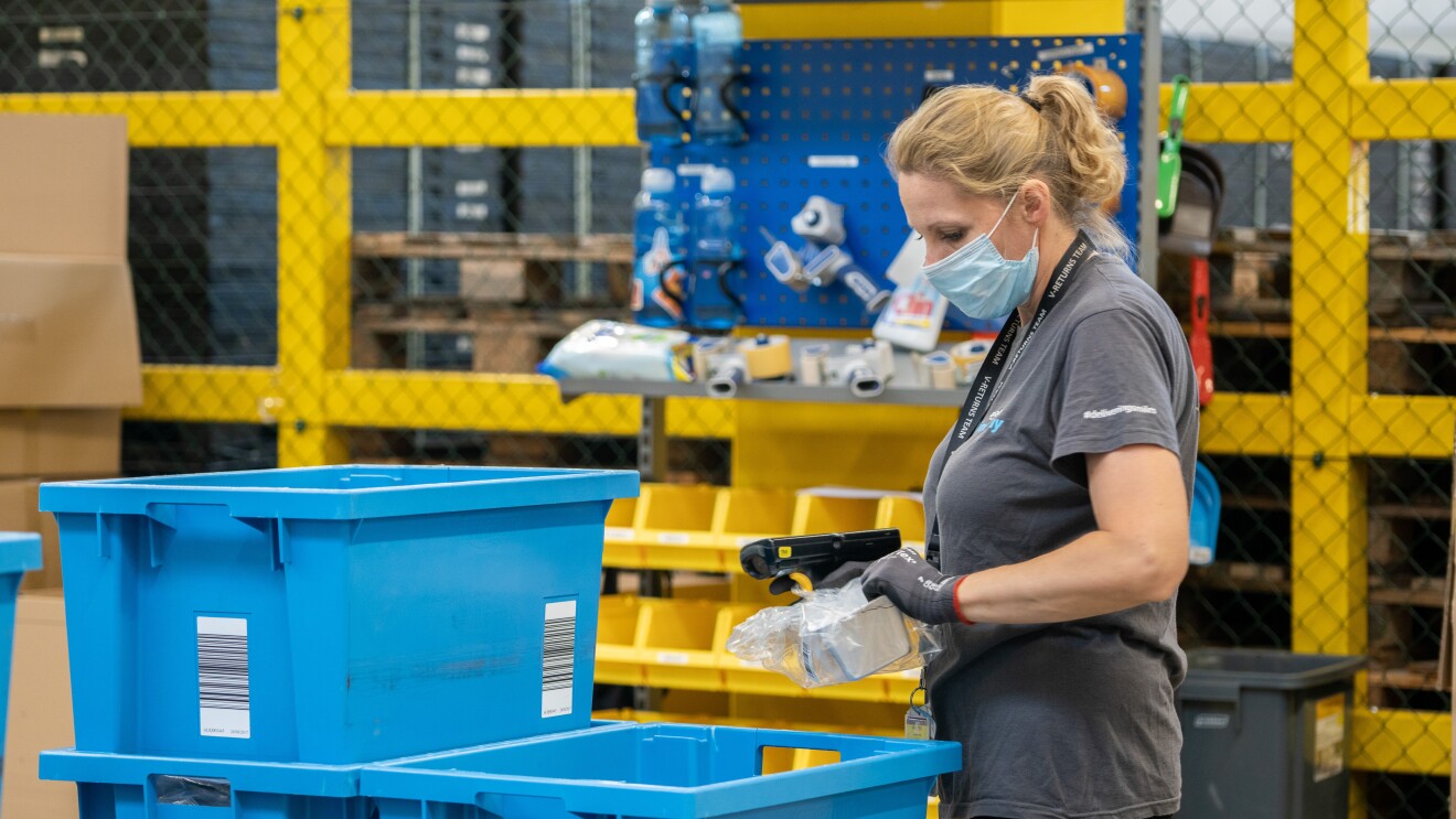 amazon employee in fulfilment centre carries out liquidation