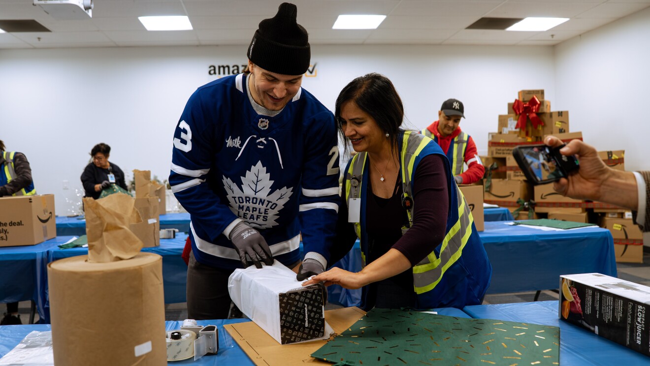 Toronto Maple Leafs hockey player packing boxes 