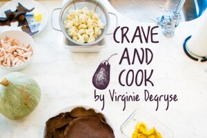 An image of the cover of the Crave and Cook holiday cookbook by Virginie Degryse.