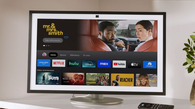 Image of Amazon's Echo Show 21 smart display on a counter with different streaming services on the screen.