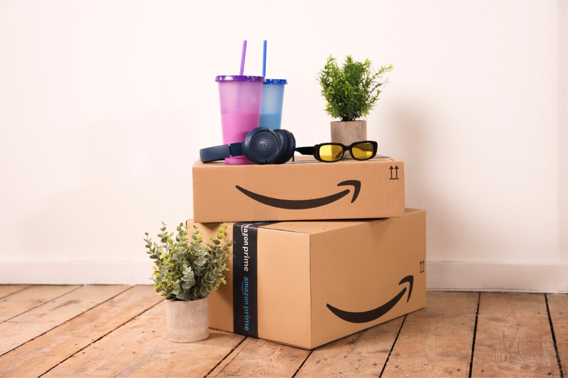 Amazon Prime boxes stacked on top of each other in a customer's home