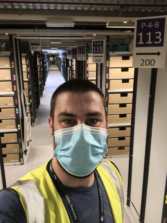 Amazon employee wearing a mask