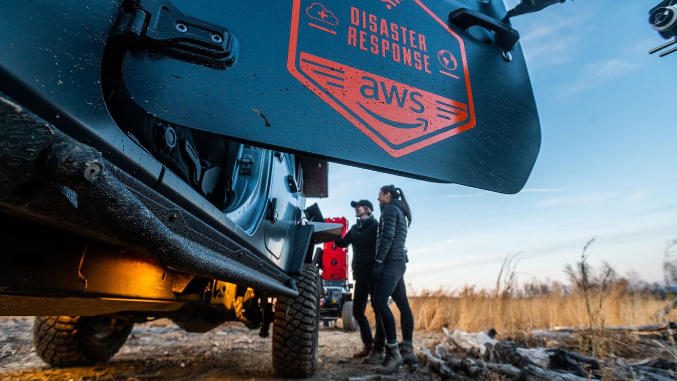 An image of a truck door with a decal on it that says "disaster response AWS."