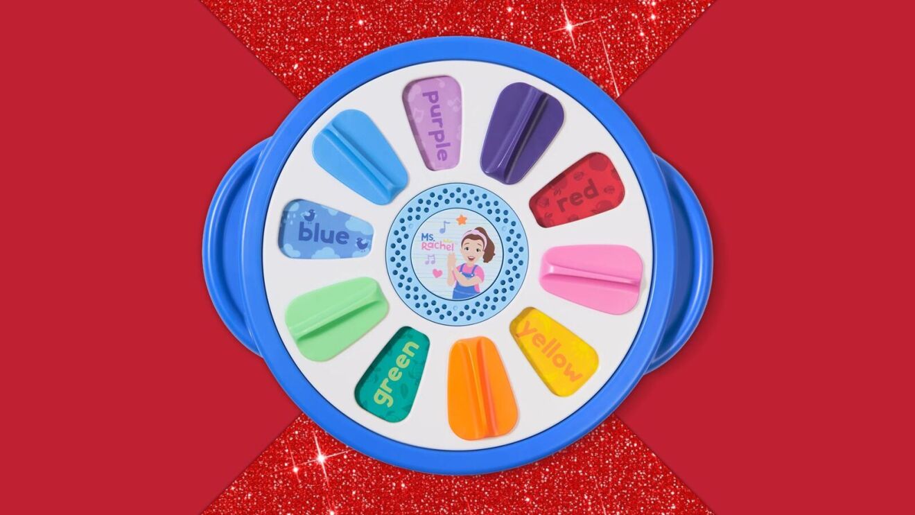 Colorful children's toy with labeled color segments around a circular base