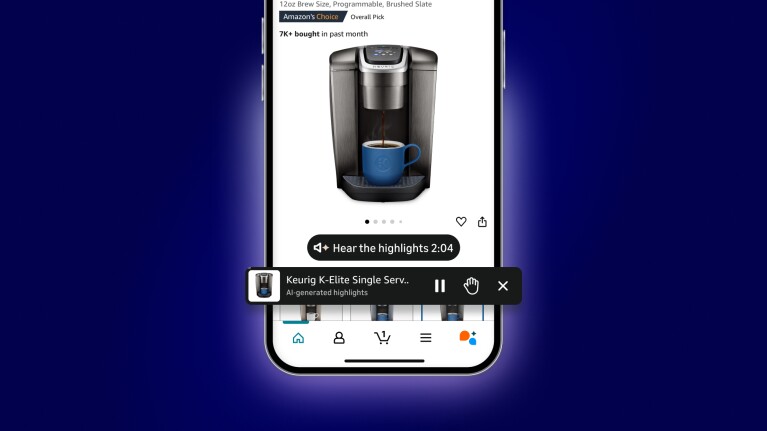 Keurig K-Elite single serve coffee maker with blue mug displayed on mobile phone screen in Amazon shopping app