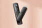 Fire TV Stick on a peach coloured background