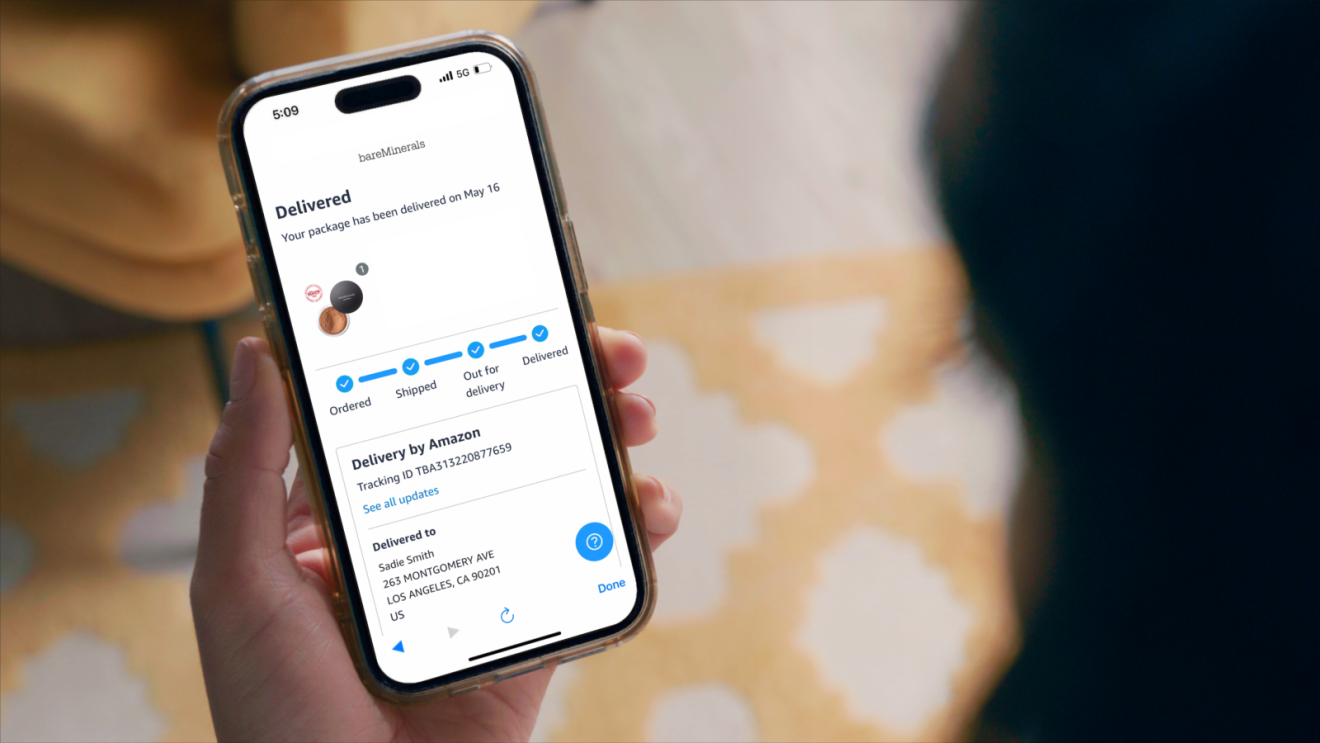 Delivery tracking on smartphone showing package delivered