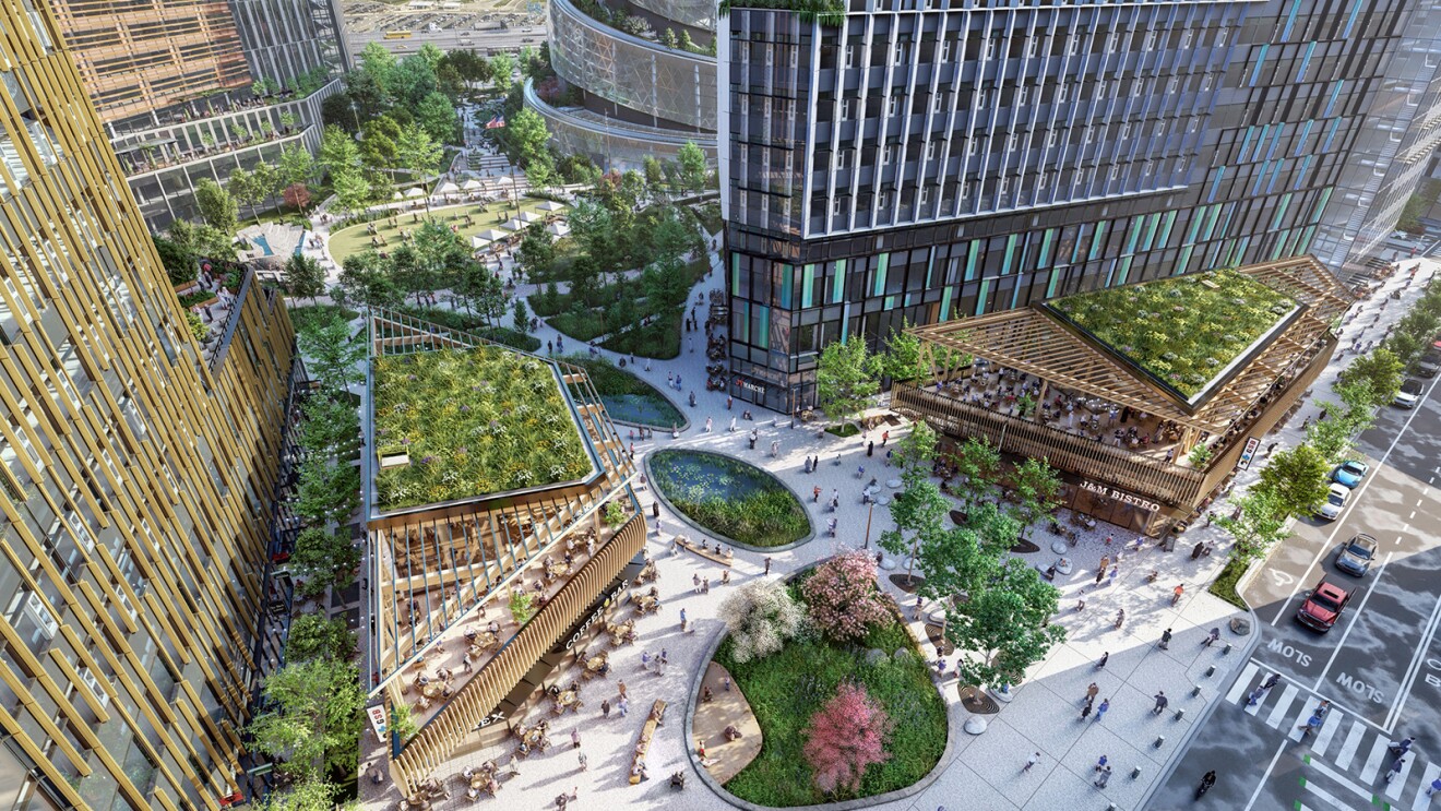 An image from HQ2 showing PenPlace, an outdoor area that will provide more than 100,000 square feet of retail space for dining, shopping, and a childcare facility. Multimodal pathways will connect throughout the site to prioritize access by foot and bike.