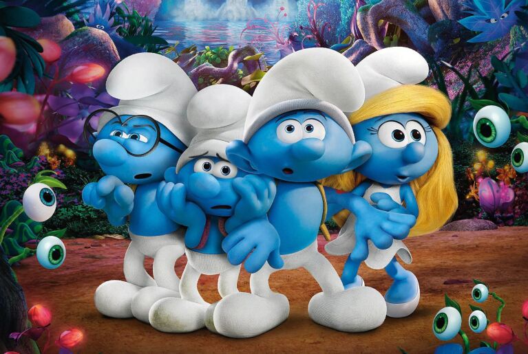 Four blue Smurfs are stand surrounded in a magical forest