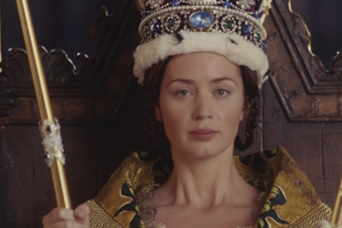 The Queen Victoria wearing a crown and holding two sticks, symbolizing her regal authority and power.