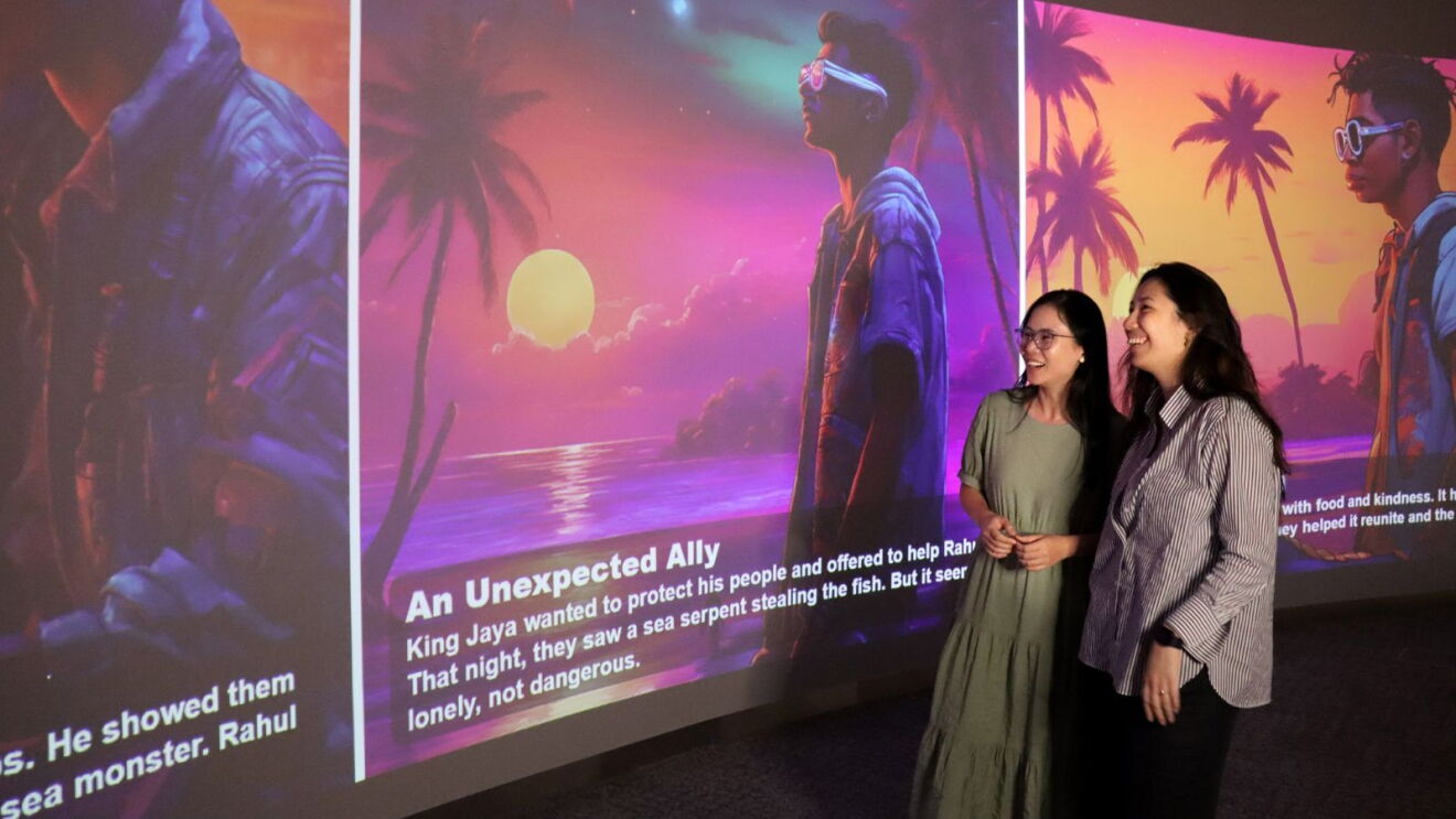Two women experiencing StoryGen, a first-of-its-kind generative AI-enabled prototype that AWS has produced for libraries.