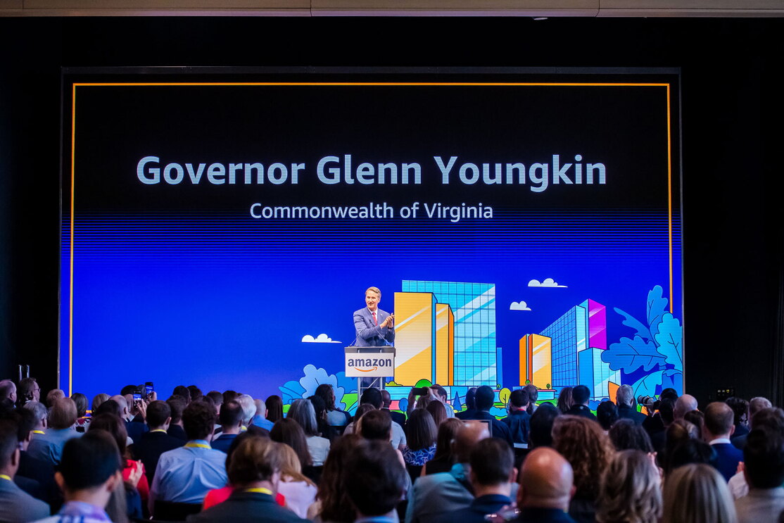 An image of local officials touring Amazon's second headquarters on its opening day