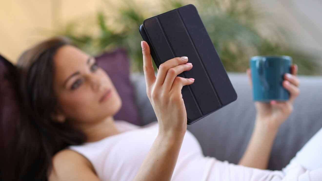 woman reading a kindle