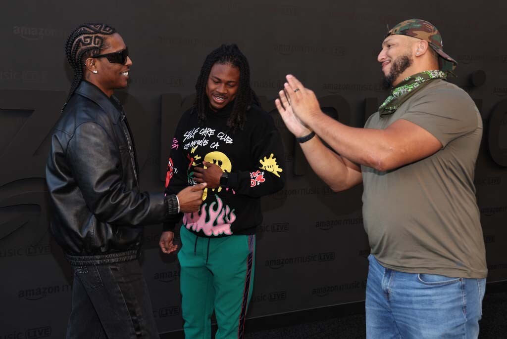 An image of ASL interpreters at the Amazon Music Live concert series