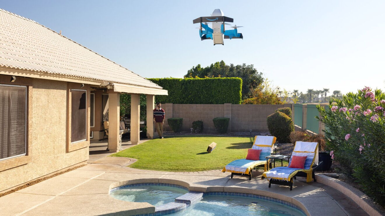 Amazon drone delivers package in customer backyard.