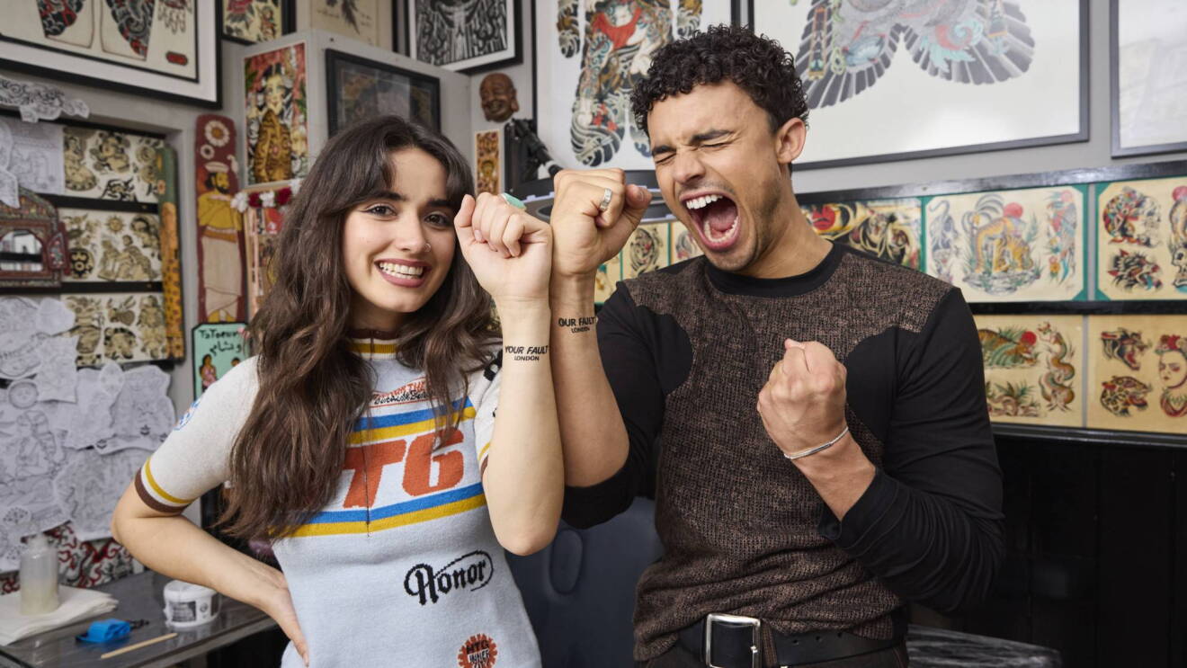 My Fault: London cast members Matthew Broome and Asha Banks pose with temporary tattoos to announce sequels Your Fault: London and Our Fault: London