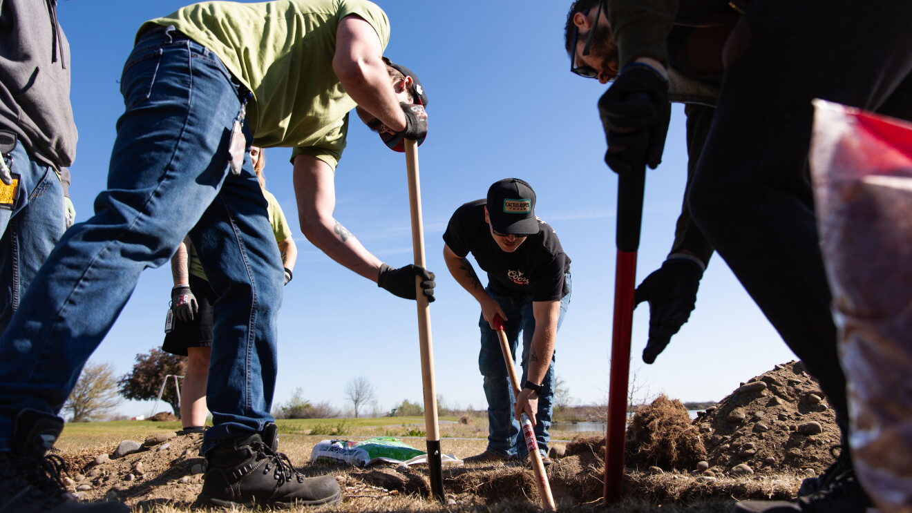Mario Sepulveda involvement with AWS: men digging into the ground