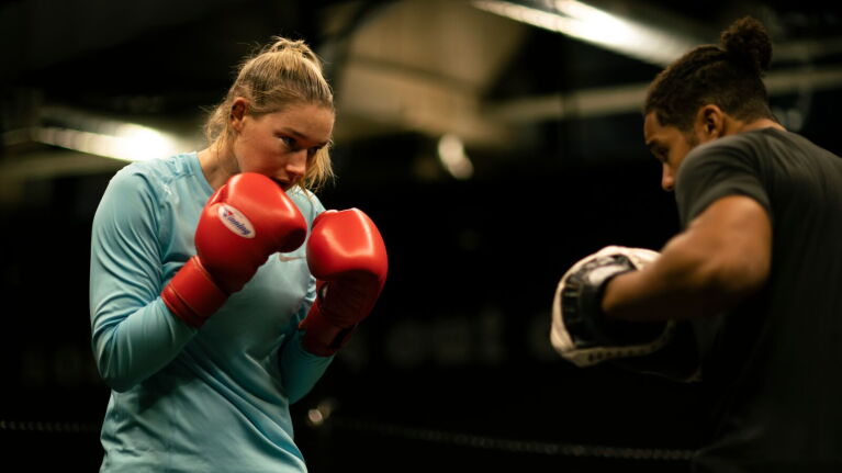 AFLW player and professional boxer Tayla Harris training.
