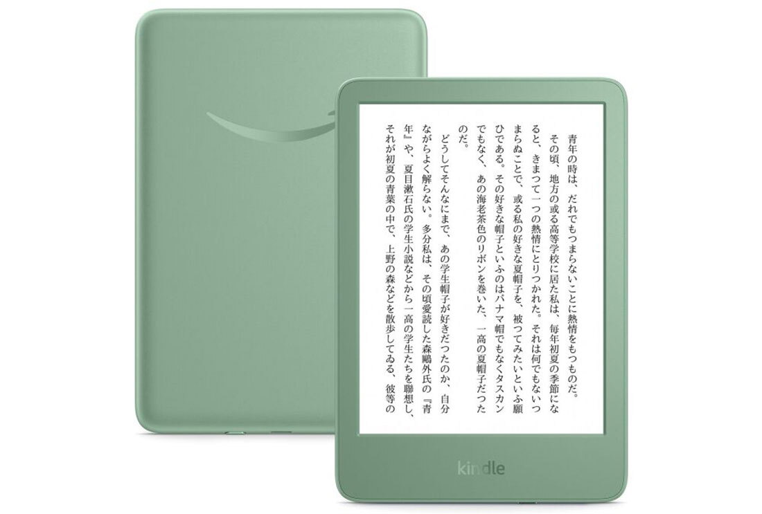 2台の緑色のタブレット端末。左は背面、前面を見せた右側はタブレットのスクリーンに小説の文章が表示されている。