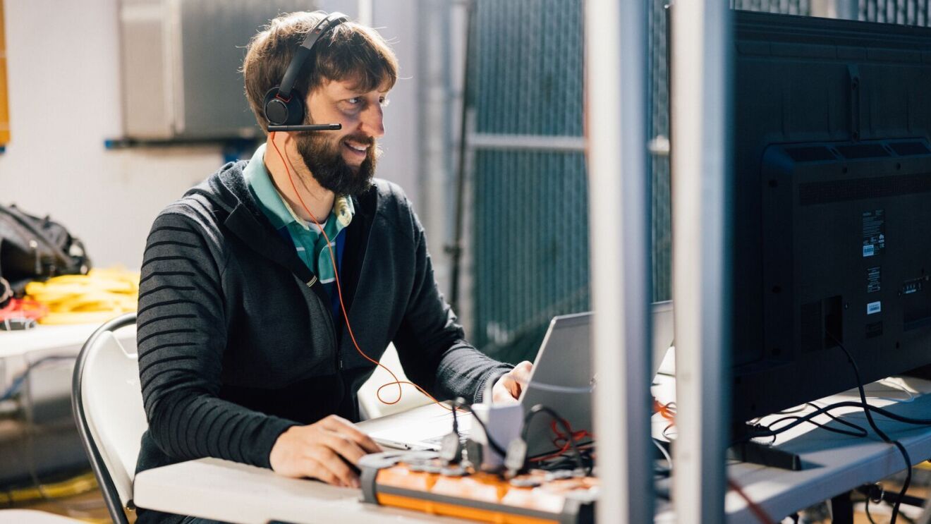 An image of the Kuiper team testing their bandwidth for the prototype satellites.