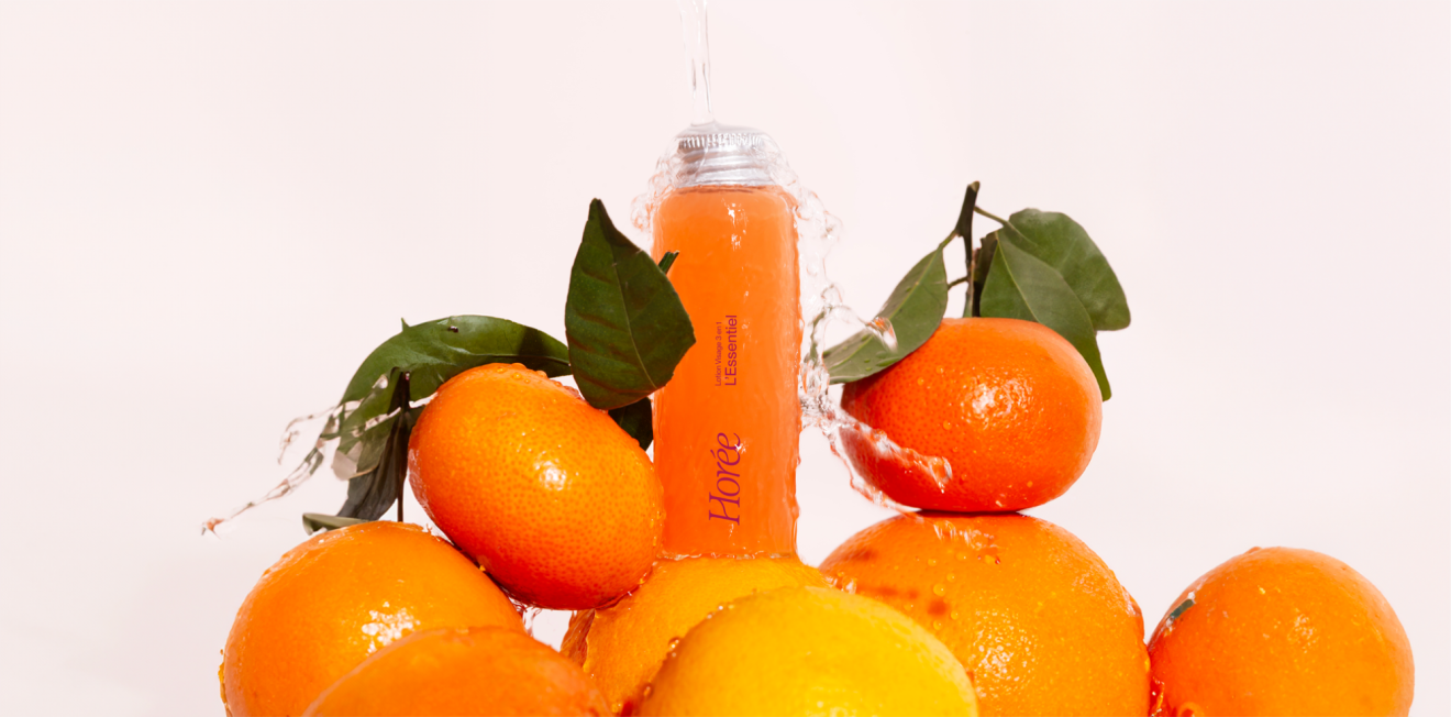 Horee Cosmetics product surrounded by fruit
