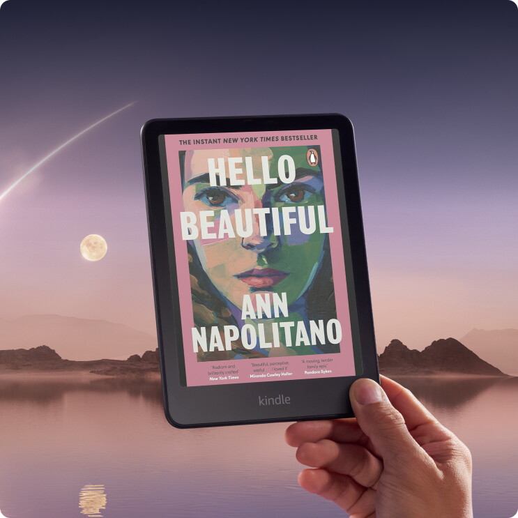 An image of a hand holding a Kindle Colorsoft