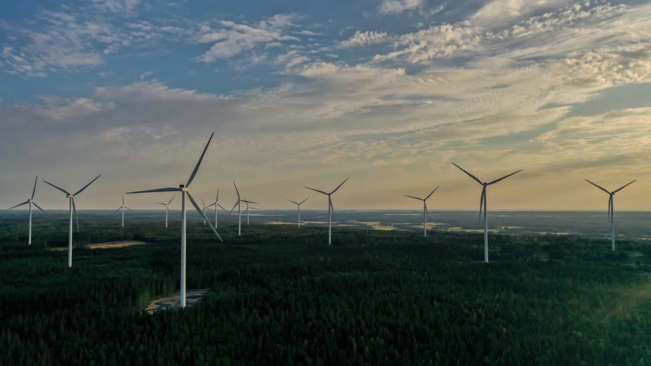 Photo looking into the horizon of wind turbines in Bäckhammar, Sweden