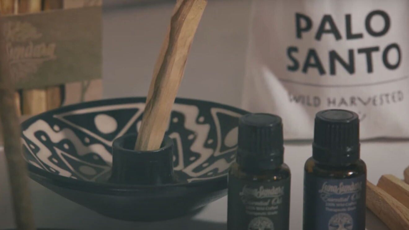 A ceramic insense holder, with Palo Santo and essential oils.