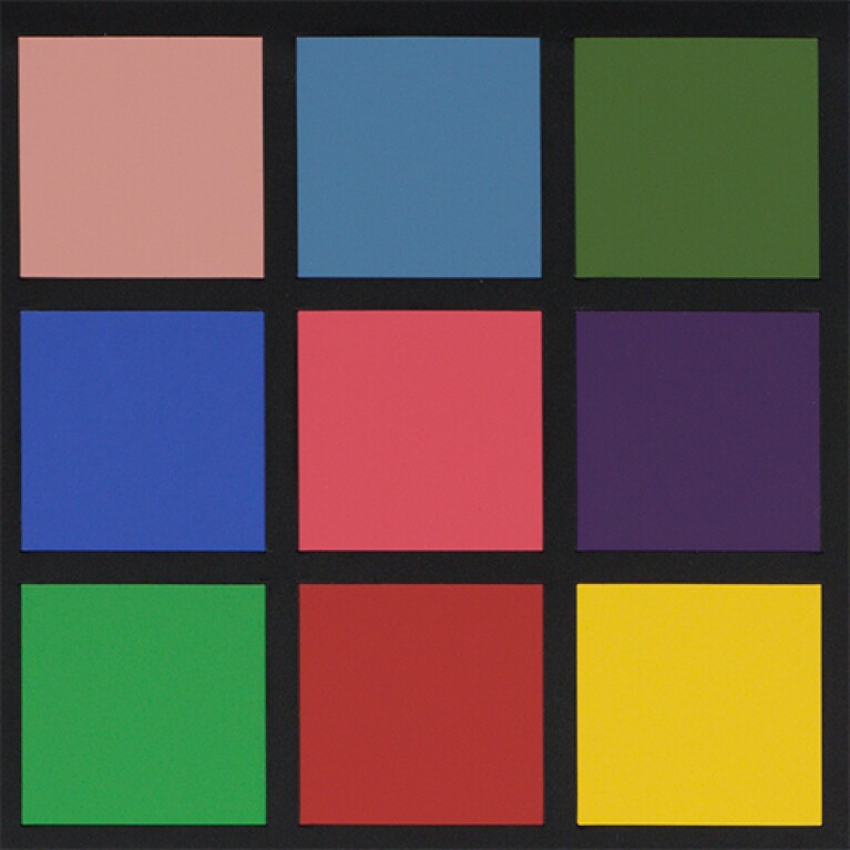 Squares of different colors are arranged in a three-by-three configuration. The colors are separated by black lines.