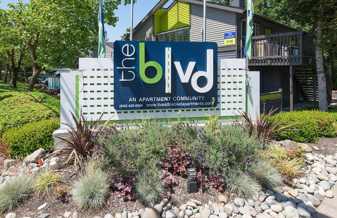 A sign of The blvd, a new apartment community.