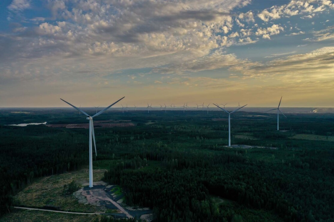 Photo of wind turbines in spread across the horizon in Bäckhammar, Sweden